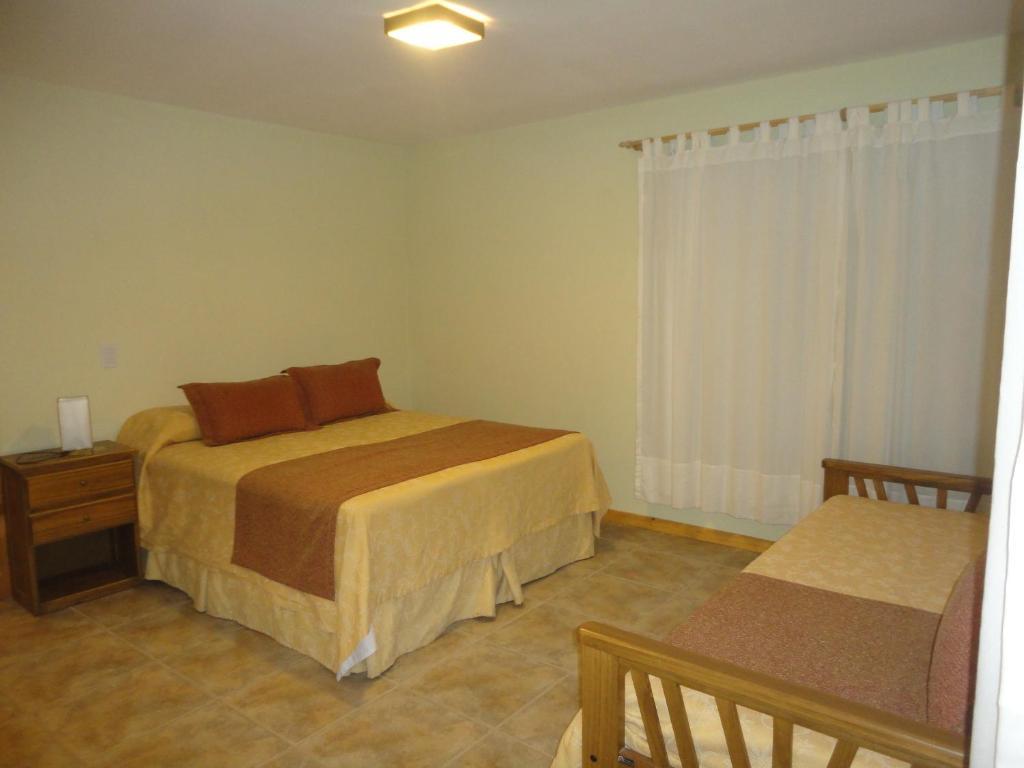 Unquehue Apartamentos Dormis Villa La Angostura Habitación foto